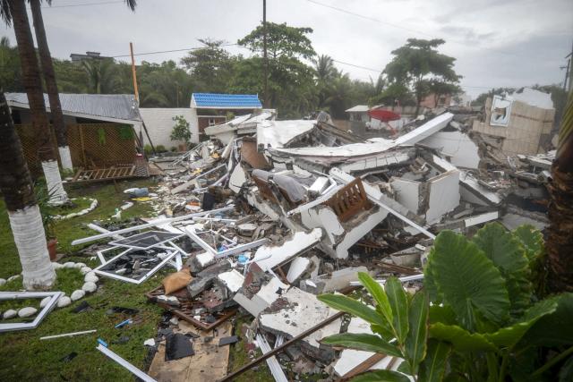 View of damage caused by rough seas ahead of the arrival of Storm Cristina in Iztapa, Guatemala on June 10, 2026. The countries of Central America remain on alert over the effects of Tropical Storm Cristina, which formed on June 8, 2026 in the Pacific Ocean, civil protection services reported. (Photo by Carlos ALONZO / AFP)