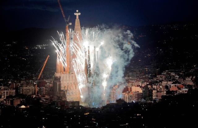Fireworks are set off around the basilica of the Sagrada Familia after Pope Leo XIV blessed Jesus Christ tower during its inauguration in Barcelona, on June 10, 2026. Pope Leo XIV is visiting Spain June 6-12 with stops in Madrid, Barcelona, and the Canary Islands, where he will meet with migrants and organisations dedicated to helping them. (Photo by Manaure Quintero / AFP)