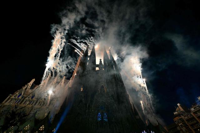 A photo taken in Barcelona, on June 10, 2026 shows a view of the fireworks during the inauguration of Jesus Christ tower by Pope Leo XIV in the Basilica of the Sagrada Familia. Pope Leo XIV is visiting Spain June 6-12 with stops in Madrid, Barcelona, and the Canary Islands, where he will meet with migrants and organisations dedicated to helping them. (Photo by Stefano RELLANDINI / AFP)