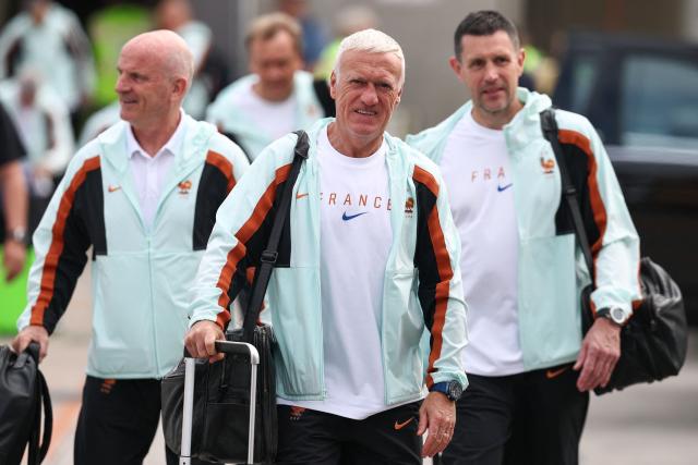 France's head coach Didier Deschamps (C) arrives at Logan Aeropuerto Internacional in Boston, Massachusetts on June 10 2026, ahead of the FIFA 2026 World Cup football tournament. (Photo by Franck FIFE / AFP)