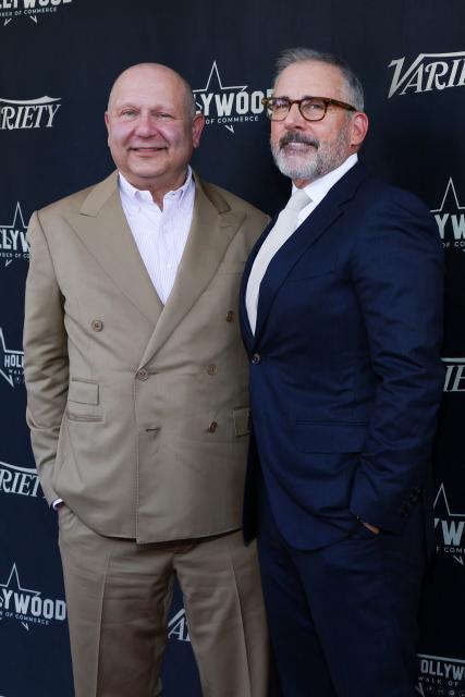 Illumination founder and CEO Chris Meledandri (L) and US actor Steve Carell attends the Hollywood Walk of Fame Star Ceremony for Meledandri on June 10, 2026 in Hollywood, California. (Photo by VALERIE MACON / AFP)