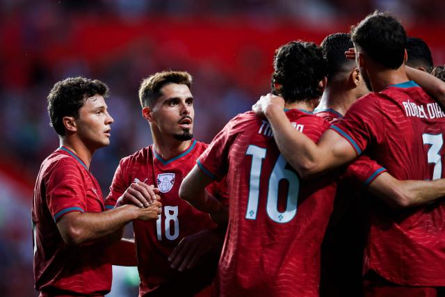 Portugal's midfielder #18 Pedro Neto celebrates scoring the opening goal during the international friendly football match between Portugal and Nigeria at Magalhaes Pessoa Stadium in Leiria, on June 10, 2026. (Photo by FILIPE AMORIM / AFP)