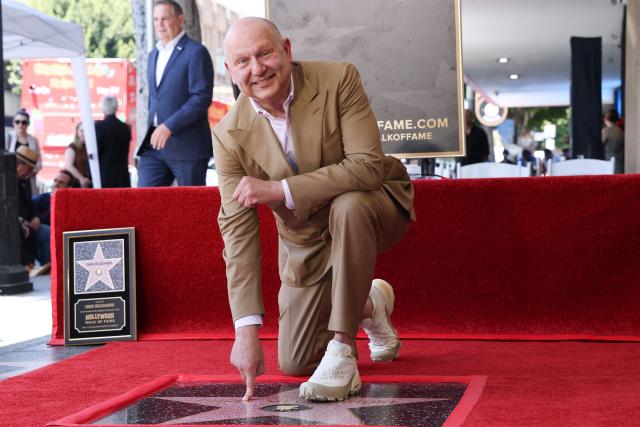 Illumination founder and CEO Chris Meledandri poses next to his newly unveiled Hollywood Walk of Fame star during a ceremony in Hollywood, California, on June 10, 2026. (Photo by VALERIE MACON / AFP)