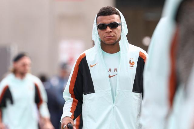 France's forward #10 Kylian Mbappe arrives at Logan Aeropuerto Internacional in Boston, Massachusetts on June 10 2026, ahead of the FIFA 2026 World Cup football tournament. (Photo by Franck FIFE / AFP)