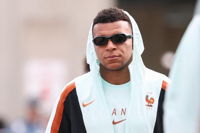 France's forward #10 Kylian Mbappe arrives at Logan Aeropuerto Internacional in Boston, Massachusetts on June 10 2026, ahead of the FIFA 2026 World Cup football tournament. (Photo by Franck FIFE / AFP)