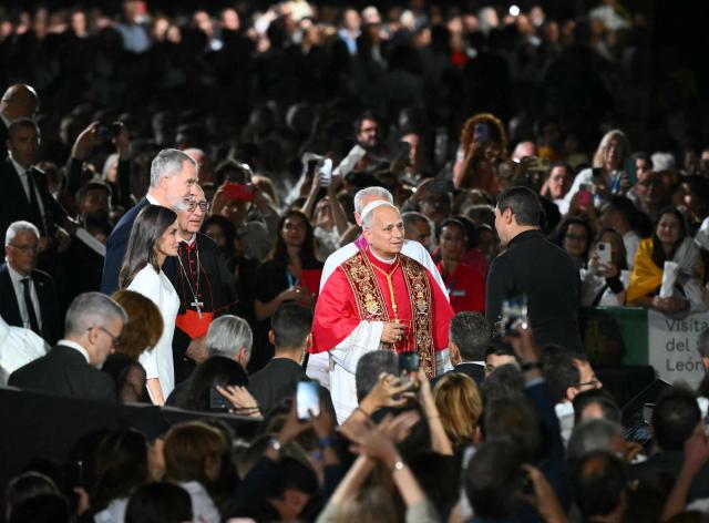 Spain's Felipe VI, Queen Letizia and Pope Leo XIV leave after a Holy Mass and the  inauguration of the Basilica of the Sagrada Familia's Jesus Christ tower in Barcelona, on June 10, 2026. Pope Leo XIV is visiting Spain June 6-12 with stops in Madrid, Barcelona, and the Canary Islands, where he will meet with migrants and organisations dedicated to helping them. (Photo by JOSE JORDAN / AFP)