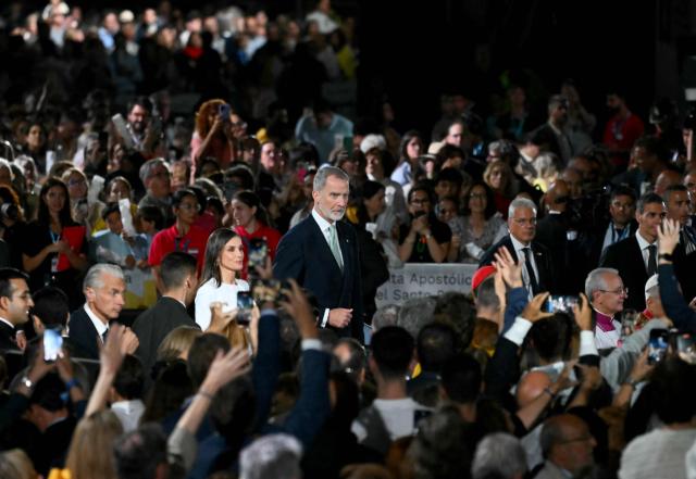 Spain's Felipe VI and Queen Letizia leave after a Holy Mass and the inauguration of the Basilica of the Sagrada Familia's Jesus Christ tower in Barcelona, on June 10, 2026. Pope Leo XIV is visiting Spain June 6-12 with stops in Madrid, Barcelona, and the Canary Islands, where he will meet with migrants and organisations dedicated to helping them. (Photo by JOSE JORDAN / AFP)