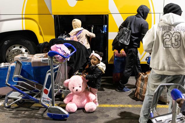 Nigerian nationals, who will be part of the first evacuation flight for Lagos, gather their belongings in front of the OR Tambo International Airport, in Johannesburg on June 10, 2026. The first batch of Nigerian nationals board an Air Peace Airlines evacuation flight chartered by the Federal Government of Nigeria, departing for Lagos amid a wave of xenophobic attacks in South Africa. Hundreds of anti-migrant protesters marched through a township outside Johannesburg on June 8, 2026, a day after South African President Cyril Ramaphosa pledged action against groups accused of fuelling xenophobic violence. South Africa has seen recurring bouts of anti-migrant violence, with protests intensifying this year after vigilante groups ordered undocumented foreigners to leave by June 30. (Photo by EMMANUEL CROSET / AFP)