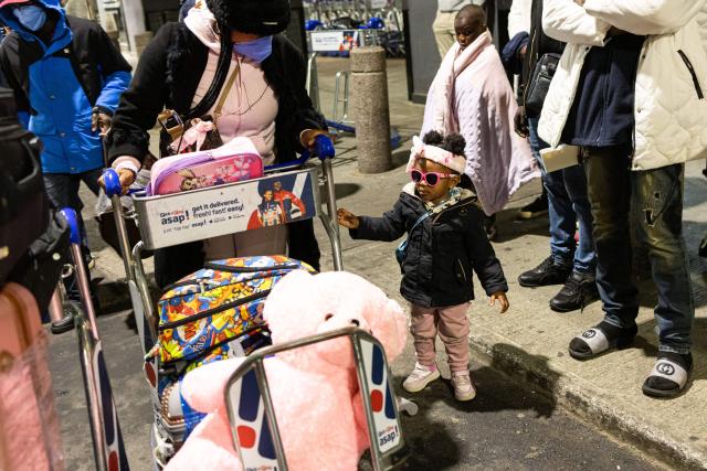 Nigerian nationals, who will be part of the first evacuation flight for Lagos, gather their belongings in front of the OR Tambo International Airport in Johannesburg on June 10, 2026. The first batch of Nigerian nationals board an Air Peace Airlines evacuation flight chartered by the Federal Government of Nigeria, departing for Lagos amid a wave of xenophobic attacks in South Africa. Hundreds of anti-migrant protesters marched through a township outside Johannesburg on June 8, 2026, a day after South African President Cyril Ramaphosa pledged action against groups accused of fuelling xenophobic violence. South Africa has seen recurring bouts of anti-migrant violence, with protests intensifying this year after vigilante groups ordered undocumented foreigners to leave by June 30. (Photo by EMMANUEL CROSET / AFP)