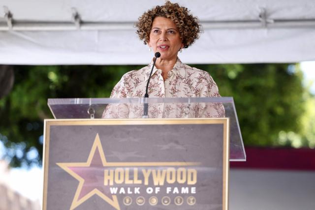 Chairwoman of NBCUniversal Studios & Entertainment Donna Langley speaks during the Hollywood Walk of Fame star ceremony for Illumination founder and CEO Chris Meledandri in Hollywood, California, on June 10, 2026. (Photo by VALERIE MACON / AFP)