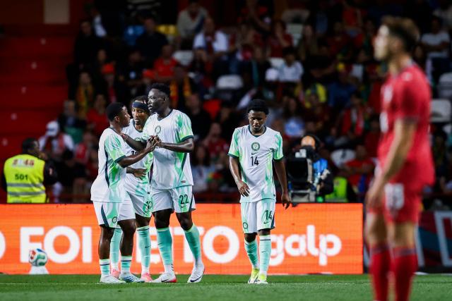 Nigeria's forward #22 Akor Jerome Adams celebrates scoring an equalizing goal during the international friendly football match between Portugal and Nigeria at Magalhaes Pessoa Stadium in Leiria, on June 10, 2026. (Photo by FILIPE AMORIM / AFP)