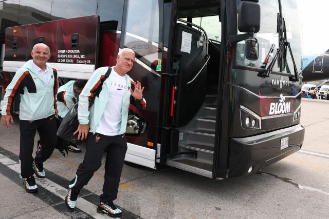 France's head coach Didier Deschamps (R) arrives at Logan Aeropuerto Internacional in Boston, Massachusetts on June 10 2026, ahead of the FIFA 2026 World Cup football tournament. (Photo by Franck FIFE / AFP)