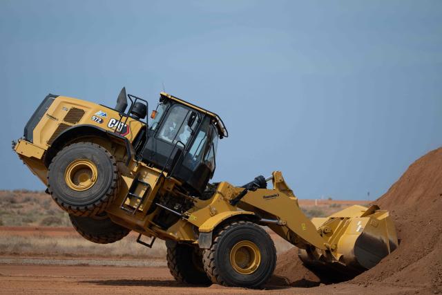 Workers test heavy machinery tires at Michelin Experience Center in Almeria on June 10, 2026. Michelin at the Almeria's Experience Center tests its prototypes, innovations and its special tires bound to face harsh competition, including from China. (Photo by JORGE GUERRERO / AFP)