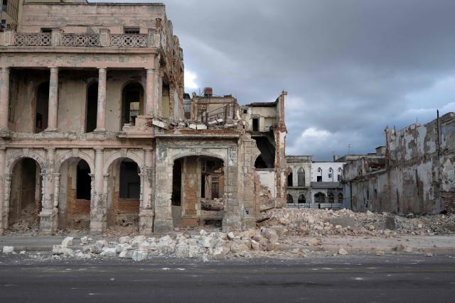 Debris from a demolished house occupies part of the seaside promenade in the Centro Habana neighborhood, in Havana on June 9, 2026. The United Nations High Commissioner for Human Rights on June 8, 2026, urged the United States to "immediately" lift the sanctions that have been accumulating against Cuba since January. "Fuel restrictions imposed since early 2026 and the recent tightening of extraterritorial sanctions are directly harming Cubans, particularly the most vulnerable," Volker Turk said in a statement. (Photo by Pablo PORCIUNCULA / AFP)