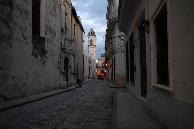 A place traditionally visited by tourists in Old Havana appears empty due to a lack of visitors in Havana on June 9, 2026. The United Nations High Commissioner for Human Rights on June 8, 2026, urged the United States to "immediately" lift the sanctions that have been accumulating against Cuba since January. "Fuel restrictions imposed since early 2026 and the recent tightening of extraterritorial sanctions are directly harming Cubans, particularly the most vulnerable," Volker Turk said in a statement. (Photo by Pablo PORCIUNCULA / AFP)