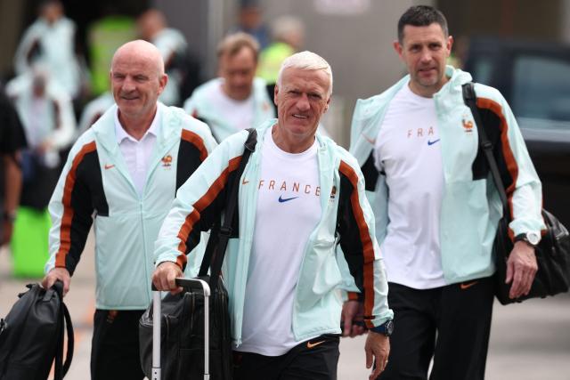 France's head coach Didier Deschamps (C) arrives at Logan Aeropuerto Internacional in Boston, Massachusetts on June 10 2026, ahead of the FIFA 2026 World Cup football tournament. (Photo by Franck FIFE / AFP)