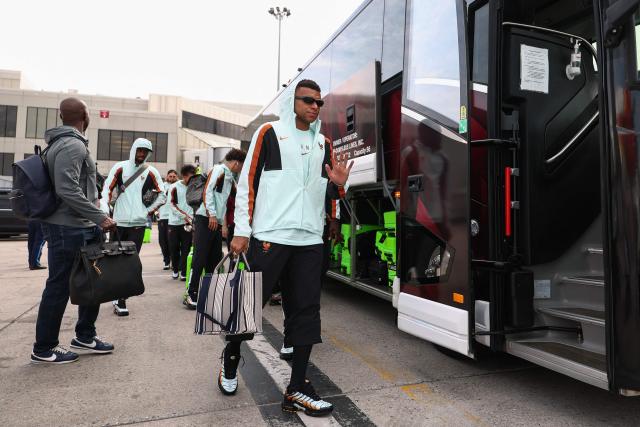 France's forward #10 Kylian Mbappe arrives at Logan Aeropuerto Internacional in Boston, Massachusetts on June 10 2026, ahead of the FIFA 2026 World Cup football tournament. (Photo by Franck FIFE / AFP)