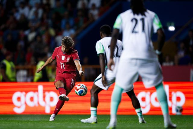 Portugal's forward #11 Joao Felix shoots during the international friendly football match between Portugal and Nigeria at Magalhaes Pessoa Stadium in Leiria, on June 10, 2026. (Photo by FILIPE AMORIM / AFP)