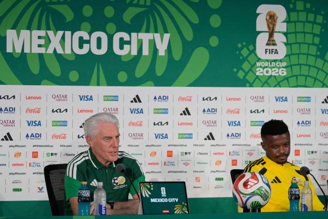 South Africa's Belgian head coach Hugo Broos (L) and midfielder Teboho Mokoena (R) give a press conference at the Mexico City Stadium in Mexico City on June 10, 2026, on the eve of the 2026 World Cup football match between Mexico and South Africa. (Photo by Alfredo ESTRELLA / AFP)