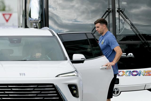 Argentina's goalkeeper Emiliano Martinez gets into a car outside the Origin Kansas City Riverfront hotel in Kansas City on June 10, 2026, ahead of the 2026 World Cup football tournament. (Photo by JUAN MABROMATA / AFP)