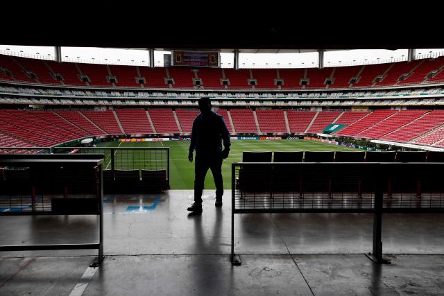 A man stands at the Guadalajara Stadium in Zapopan, Mexico on June 10, 2026, on the eve of the 2026 World Cup football match between South Korea and the Czech Republic. (Photo by Ulises RUIZ / AFP)