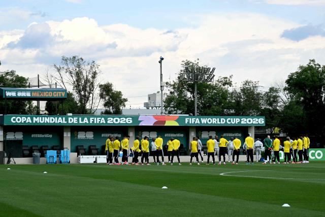 South Africa's players gather in circle during a training session at the Club America Training Site in Mexico City on June 10, 2026, on the eve of the 2026 World Cup football match between Mexico and South Africa. (Photo by YURI CORTEZ / AFP)