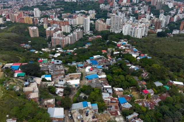 Aerial view of the Normandia neighbourhood in the western region of Cali, Colombia on June 10, 2026. (Photo by JOAQUIN SARMIENTO / AFP)