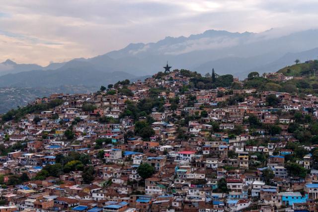 Aerial view of the Siloe neighbourhoods in the western region of Cali, Colombia on June 10, 2026. (Photo by JOAQUIN SARMIENTO / AFP)
