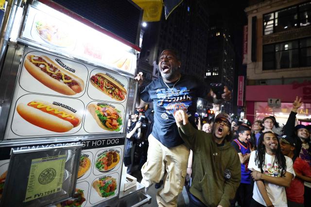 York Knicks fans cheer outside Madison Square Garden during Game 4 of the NBA Finals between the New York Knicks and the San Antonio Spurs in New York on June 10, 2026. (Photo by CHARLY TRIBALLEAU / AFP)
