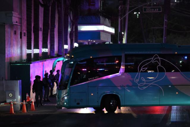 Mexican National Guard officers escort the bus carrying Iran's players as it arrives at the Marriott Hotel after a training session in Tijuana, Mexico, on June 10, 2026, ahead of the 2026 FIFA World Cup football tournament. (Photo by Guillermo Arias / AFP)