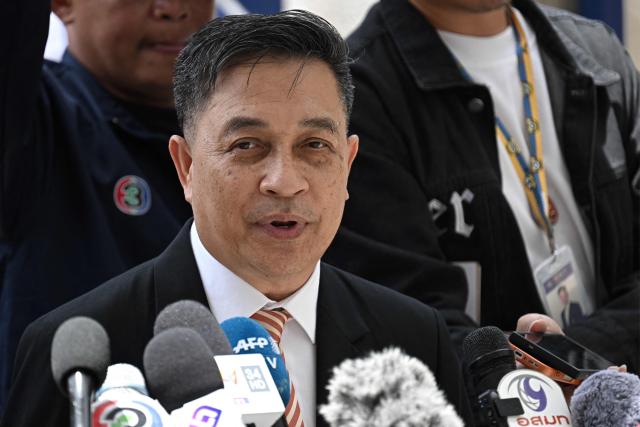 Lawyer Choochat Kanpai, representing bombing suspects Bilal Mohammed and Yusufu Mieraili, speaks to the media at the Bangkok South Criminal Court in Bangkok on June 11, 2026, after the verdict for the Erawan Shrine bombing on August 17, 2015. Two Uyghur men were sentenced to death on June 11 for carrying out a 2015 attack on a Bangkok shrine that killed 20 people, a long-awaited verdict in Thailand's deadliest bombing case. (Photo by Lillian SUWANRUMPHA / AFP)