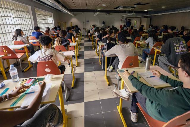 Students prepare to take the French language exam of the French baccalaureate at Périer High School in Marseille on June 11, 2026. (Photo by MIGUEL MEDINA / AFP)