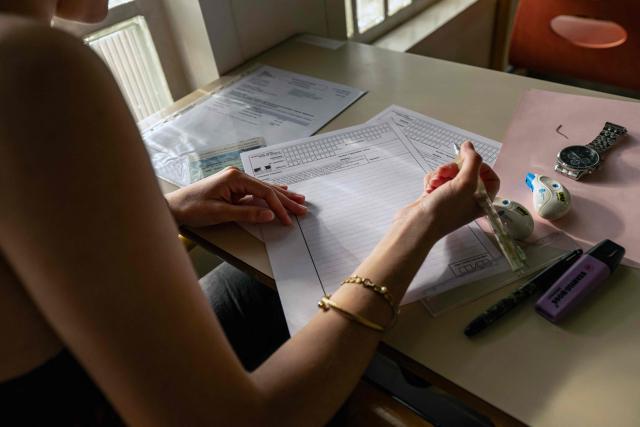 A student prepares to take the French language exam of the French baccalaureate at Perier High School in Marseille on June 11, 2026. (Photo by MIGUEL MEDINA / AFP)