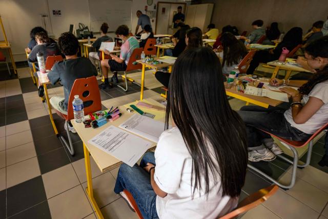 Students prepare to take the French language exam of the French baccalaureate at Perier High School in Marseille on June 11, 2026. (Photo by MIGUEL MEDINA / AFP)