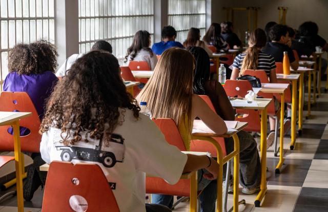Students prepare to take the French language exam of the French baccalaureate at Perier High School in Marseille on June 11, 2026. (Photo by MIGUEL MEDINA / AFP)