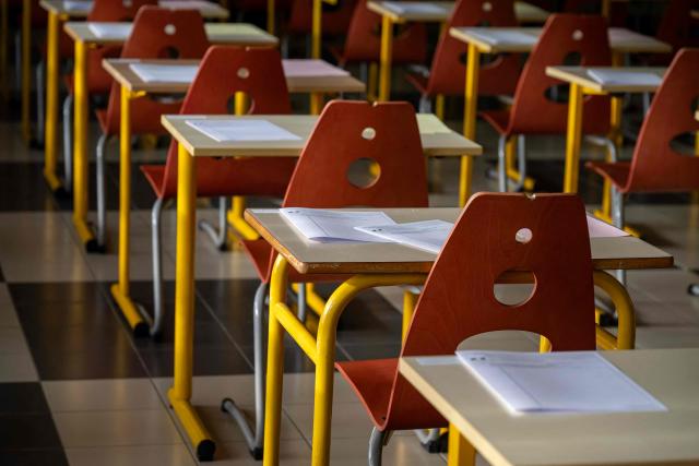 This photograph shows classroom desks before students take the French-language exam of the French baccalaureate at Perier High School in Marseille on June 11, 2026. (Photo by MIGUEL MEDINA / AFP)