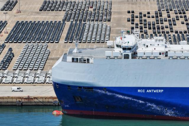 Chinese-made cars are seen before being loading for export at a port in Yantai, in China’s eastern Shandong province on June 11, 2026. (Photo by CN-STR / AFP) / China OUT