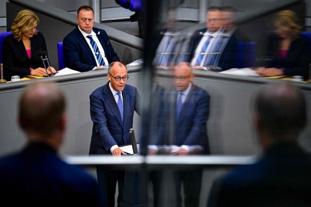 German Chancellor Friedrich Merz delivers  a speach at the German Bundestag (lower house of parliament) on June 11, 2026, ahead of an EU summit. (Photo by John MACDOUGALL / AFP)