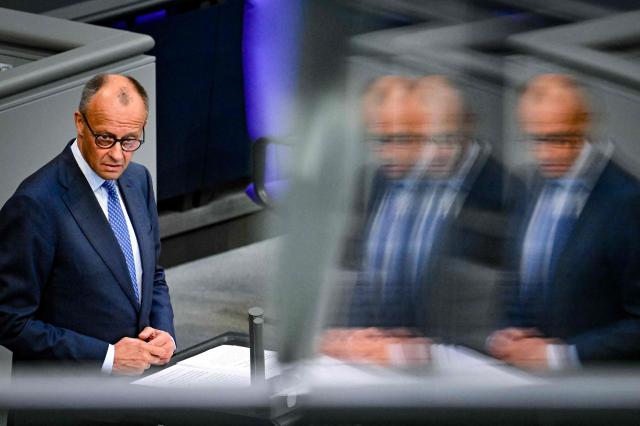 German Chancellor Friedrich Merz delivers  a speach at the German Bundestag (lower house of parliament) on June 11, 2026, ahead of an EU summit. (Photo by John MACDOUGALL / AFP)