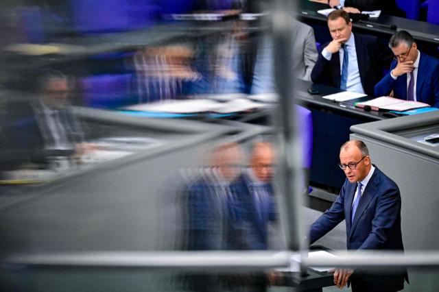 German Chancellor Friedrich Merz delivers  a speach at the German Bundestag (lower house of parliament) on June 11, 2026, ahead of an EU summit. (Photo by John MACDOUGALL / AFP)