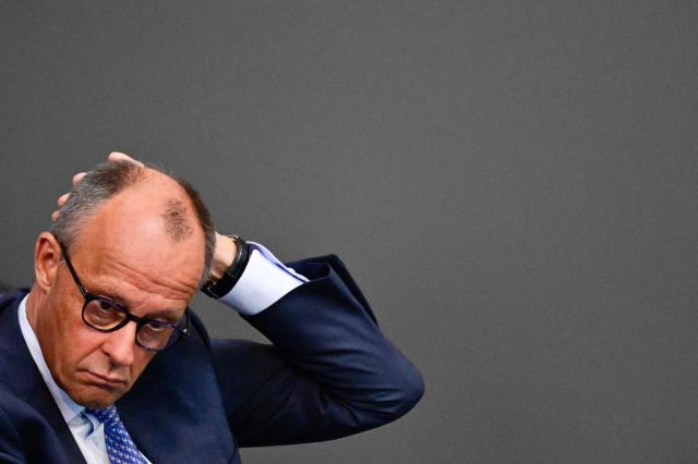 German Chancellor Friedrich Merz attends a sitting of the German Bundestag (lower house of parliament) on June 11, 2026, ahead of an EU summit. (Photo by John MACDOUGALL / AFP)