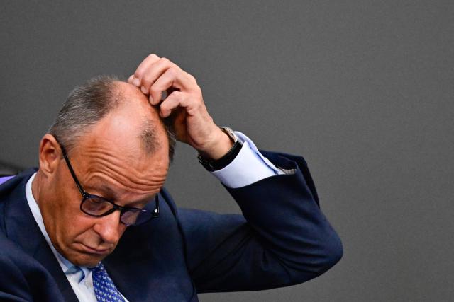 German Chancellor Friedrich Merz attends a sitting of the German Bundestag (lower house of parliament) on June 11, 2026, ahead of an EU summit. (Photo by John MACDOUGALL / AFP)