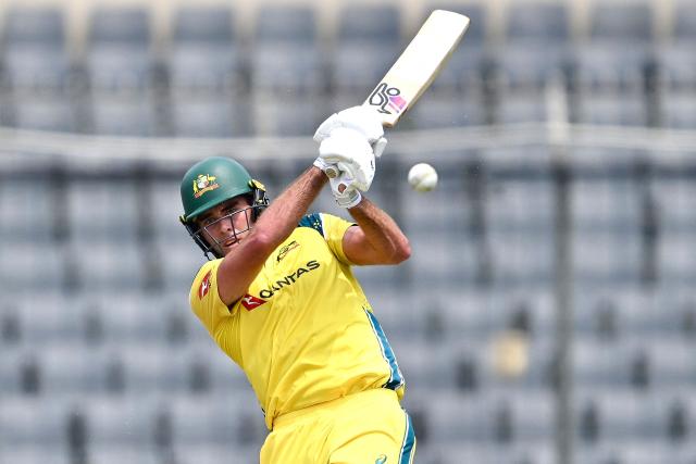Australia’s Xavier Bartlett plays a shot during the second one-day international (ODI) cricket match between Bangladesh and Australia at the Sher-e-Bangla National Cricket Stadium in Dhaka on June 11, 2026. (Photo by MUNIR UZ ZAMAN / AFP)