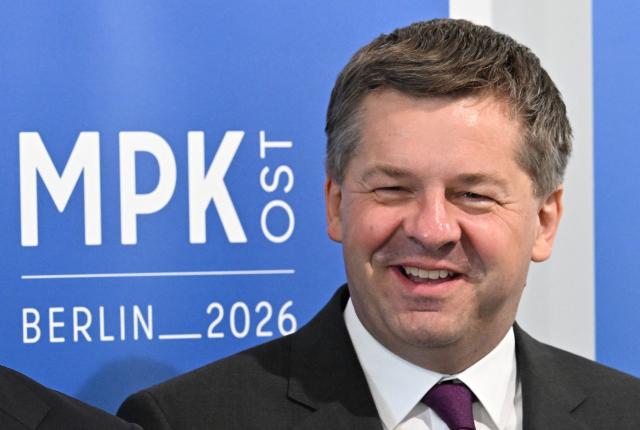 Saxony-Anhalt's State Premier Sven Schulze arrives for a conference of the state leaders of Germany's eastern federal states in Schoenefeld, southeast of Berlin, on June 11, 2026. (Photo by RALF HIRSCHBERGER / AFP)