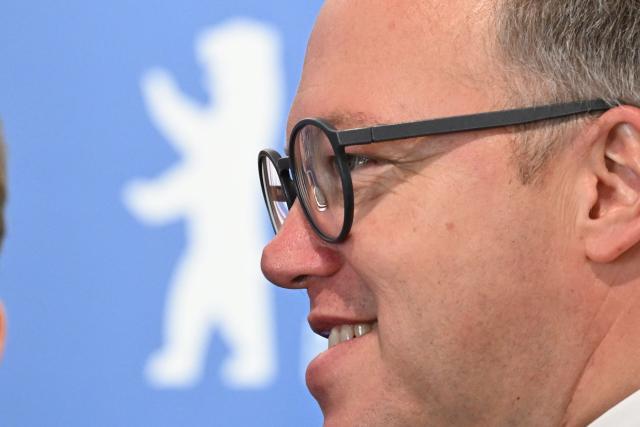 Thuringia's State Premier Mario Voigt arrives for a conference of the state leaders of Germany's eastern federal states in Schoenefeld, southeast of Berlin, on June 11, 2026. (Photo by RALF HIRSCHBERGER / AFP)