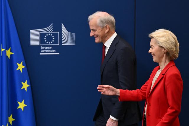 European Commission President Ursula von der Leyen (R) welcomes Norway's Prime Minister Jonas Gahr Store before a meeting at the EU Commission headquarters in Brussels on June 11, 2026. (Photo by Nicolas TUCAT / AFP)