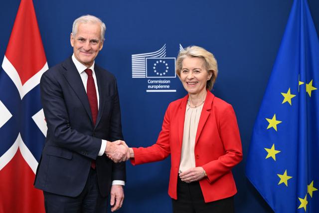 European Commission President Ursula von der Leyen (R) poses with Norway's Prime Minister Jonas Gahr Store (L) before a meeting at the EU Commission headquarters in Brussels on June 11, 2026. (Photo by Nicolas TUCAT / AFP)