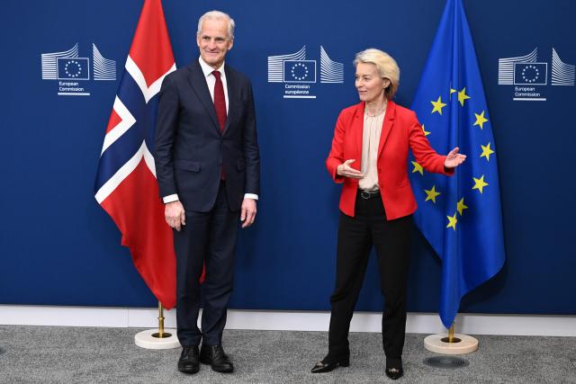 European Commission President Ursula von der Leyen (R) welcomes Norway's Prime Minister Jonas Gahr Store (L) before a meeting at the EU Commission headquarters in Brussels on June 11, 2026. (Photo by Nicolas TUCAT / AFP)
