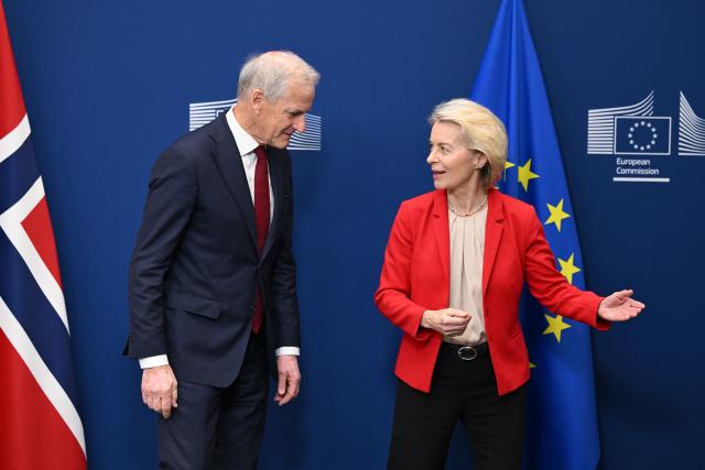 European Commission President Ursula von der Leyen (R) welcomes Norway's Prime Minister Jonas Gahr Store (L) before a meeting at the EU Commission headquarters in Brussels on June 11, 2026. (Photo by Nicolas TUCAT / AFP)
