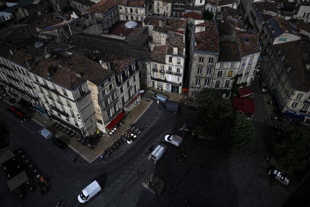 This photograph taken from the top of the restored Saint-Michel bell tower facades of buildings of the old city in Bordeaux, southwestern France on June 11, 2026. The 114-meter high Saint-Michel, built at the end of the 15th century, is set to reopen to the public on June 13 following five years of restoration. (Photo by Christophe ARCHAMBAULT / AFP)